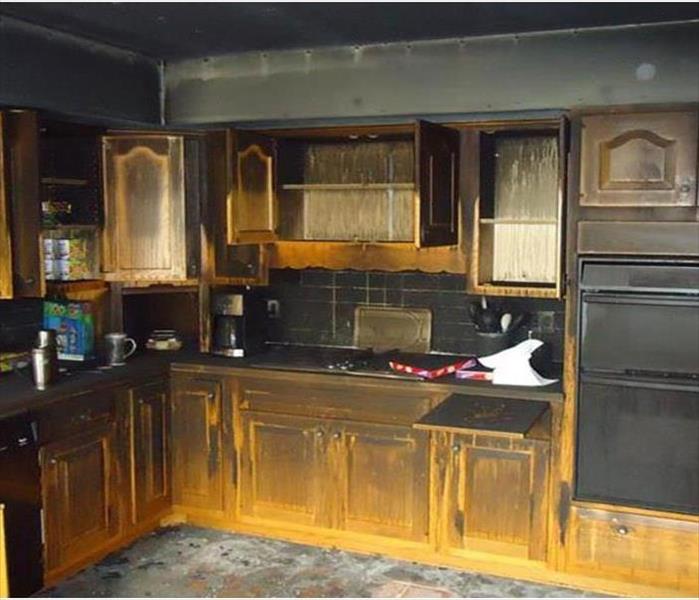 Structural And Smoke Damage In A Kitchen