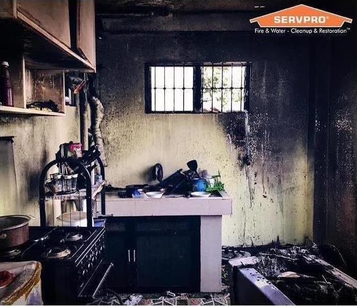 A kitchen destroyed by a fire.